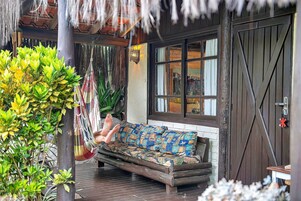 Loft Design - Pousada Rosa da Praia | Varanda coberta