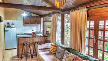 Loft Design - Pousada Rosa da Praia | Private kitchen | Fridge, cookware/dishes/utensils, dining tables