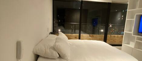 1 dormitorio, tabla de planchar con plancha, wifi gratis y ropa de cama