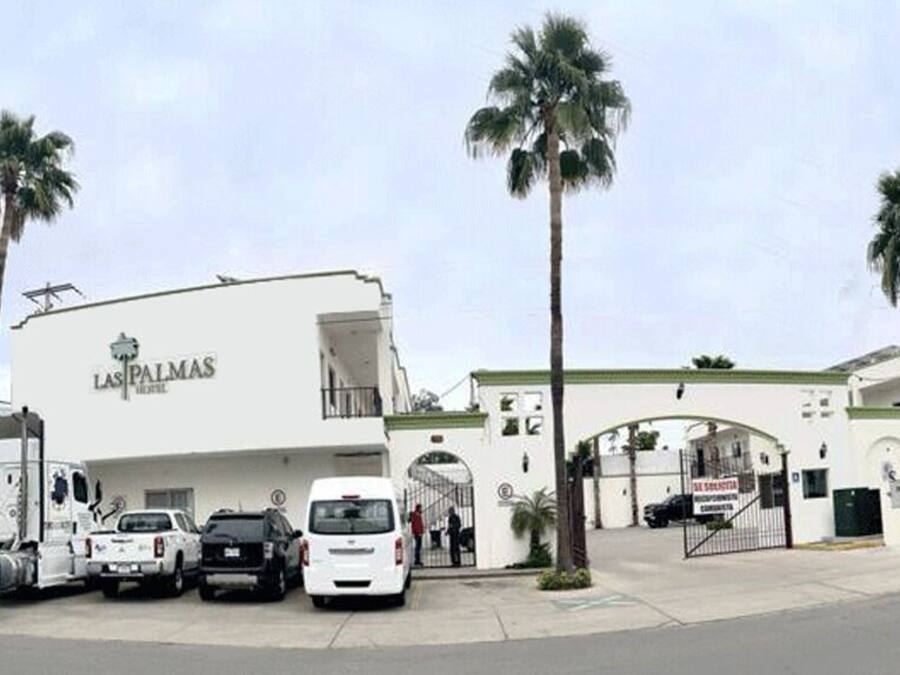 Un bâtiment sur lequel on peut lire l’inscription « Las Palmas ».