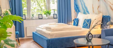 1 bedroom, desk, iron/ironing board, travel cot