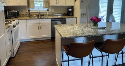 Charming 4-bedroom house with fence yard, WiFi, and in a great location.