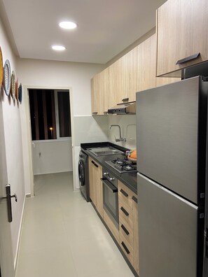 Refrigerador, horno, parrilla de estufa y tostadora