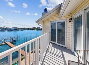 Terrace/patio - Coastal living with water views, sunrises, sunsets and boat slip (Treasure Island)