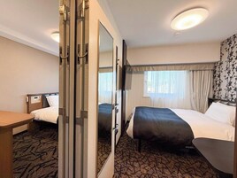 Down comforters, desk, laptop workspace, blackout drapes