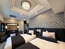 Deluxe Twin Room, Non Smoking | Down comforters, desk, laptop workspace, blackout drapes