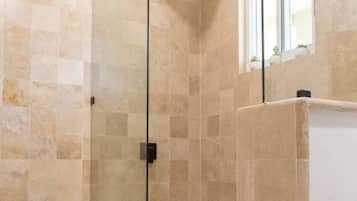 Shower, eco-friendly toiletries, hair dryer, towels