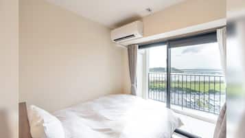 1 室のベッドルーム、デスク、WiFi (無料)、ベッドシーツ