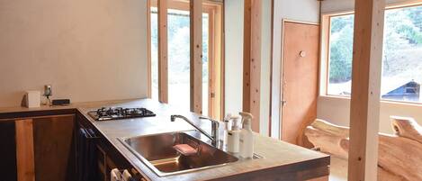 Fridge, microwave, stovetop, cookware/dishes/utensils