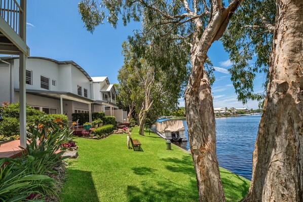 Enjoy serene lakeside views and easy access to water activities from this modern lakeside retreat.