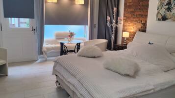 1 dormitori, planxa i posts de planxar, wifi gratuïta i roba de llit