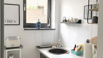 Fridge, coffee/tea maker, electric kettle, toaster