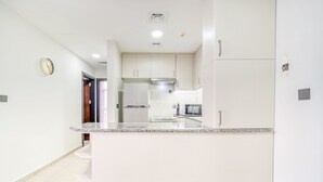 Family Apartment, City View | Private kitchen - KOHH - 2BR in Oasis Residence 2 (Dubai)