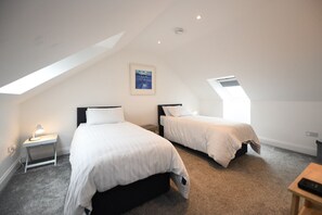 2 dormitorios, tabla de planchar con plancha, wifi gratis y ropa de cama