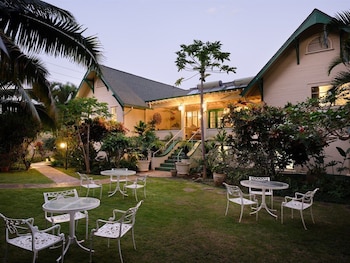 Exclusive Suite | 1 bedroom, desk, laptop workspace, iron/ironing board at The Historic Wailuku Inn