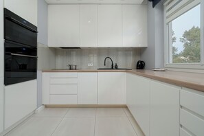 Apartment, 1 Bedroom, Balcony | Private kitchen - Spacious Apartment in Gdynia by Renters (Gdynia)