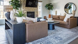 Smart TV, fireplace, books, offices