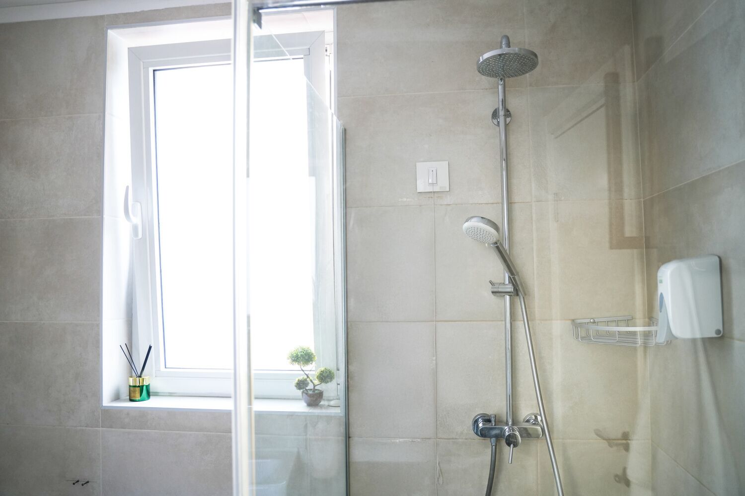Basic Quadruple Room | Bathroom | Shower, hair dryer, towels, soap