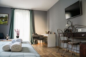 1 bedroom, desk, laptop workspace, iron/ironing board