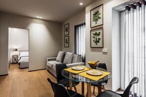 Deluxe Apartment | Living area - Ferrini Home - Riso 74 (Catania)