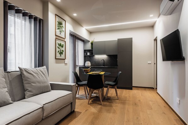 Deluxe Apartment | Living area - Ferrini Home - Riso 74 (Catania)