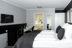 Quarto casal | Área de estar | TV