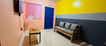 Cozy apartment in welcoming Tagbilaran City with AC, WiFi Free Parking 