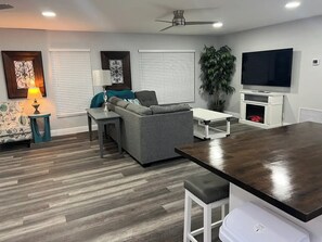 Smart TV, fireplace, books