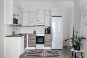 Deluxe Studio, City View | Private kitchen | Coffee/tea maker, electric kettle, toaster