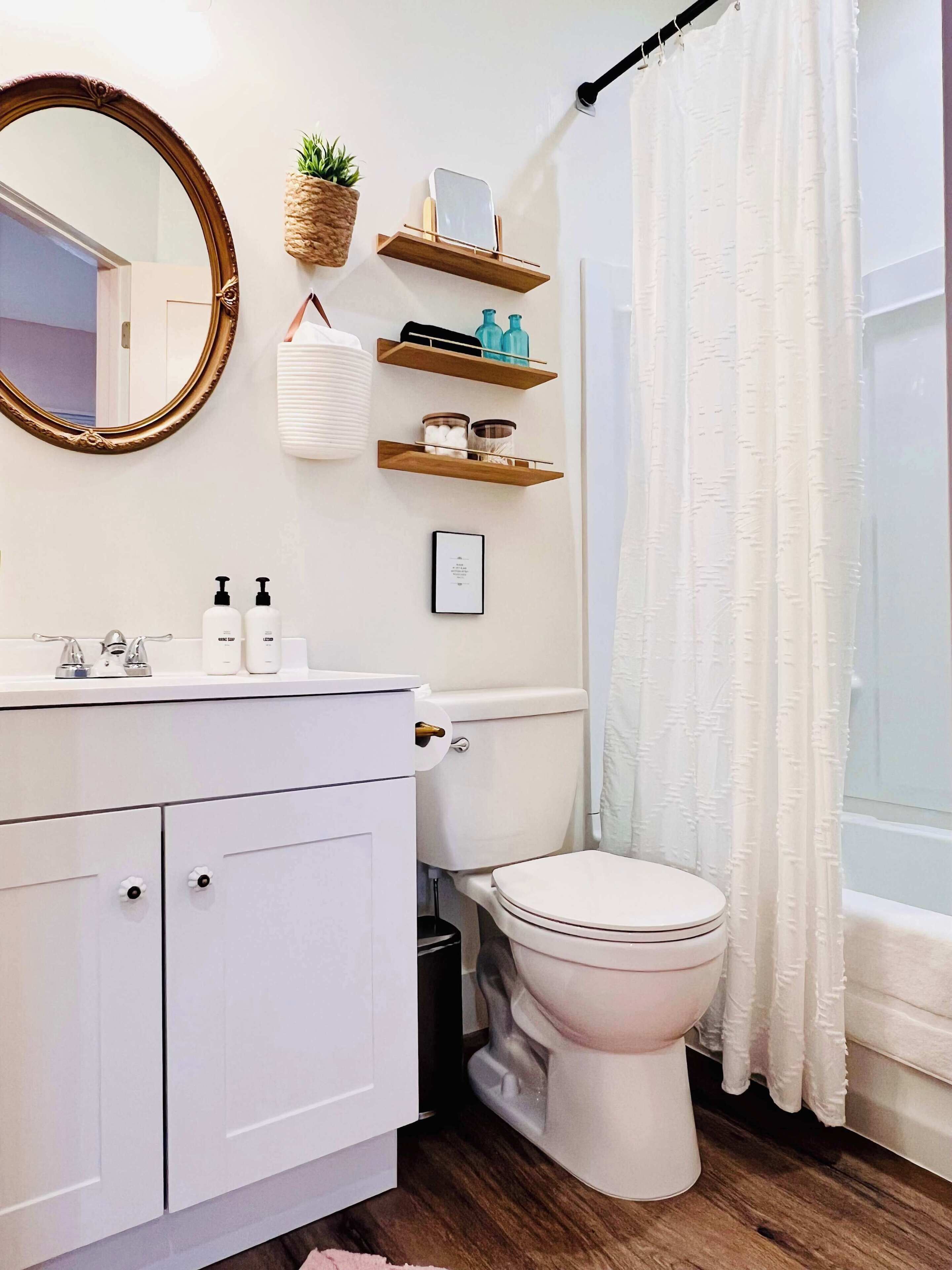 Shower, hair dryer, towels, shampoo