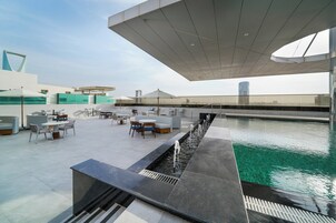 Outdoor pool, open 6:30 AM to 10:00 PM, pool umbrellas, sun loungers