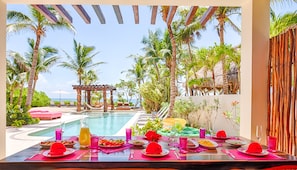 Outdoor dining - Alma Rosa: Jade Bay's jewel, elegant beachfront villa with a heated pool! (Akumal)
