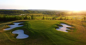 Enjoy a round of golf on our well-maintained fairway surrounded by dense forests.