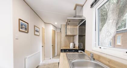 Curlew is a brand new property situated on the boutique Sandhills Holiday Park in Mudeford