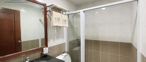 Shower, towels, toilet paper
