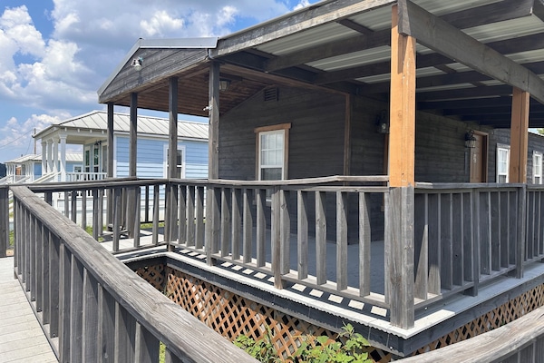 Junior Cabin, 2 Bedrooms, Lake View | 1 bedroom, individually decorated, individually furnished
