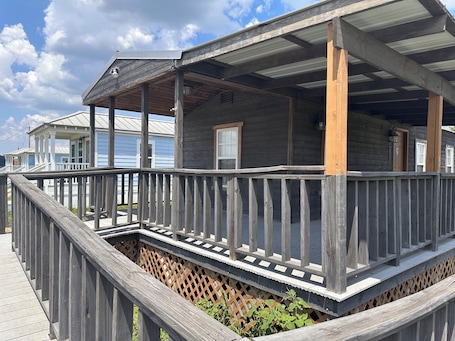 Junior Cabin, 2 Bedrooms, Lake View | 1 bedroom, individually decorated, individually furnished