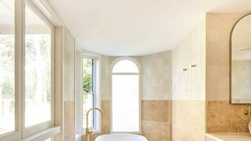 Standard Suite | Bathroom | Hair dryer, bathrobes, towels, soap