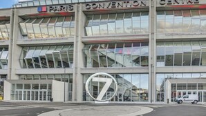 A modern building with a glass facade, labeled "Paris Convention Centre." - Résidence du Parc Vanves (Vanves)