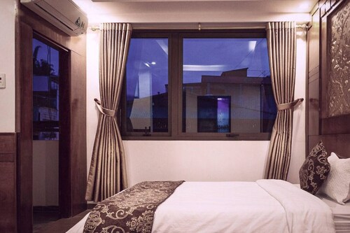 Room 5: Violet - Greenland Sa Pa Hotel by DLMH

