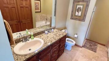 Jetted tub, hair dryer, towels, soap