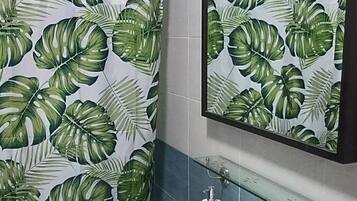 Bidet, towels, soap, toilet paper