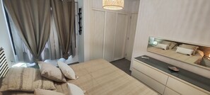 2 slaapkamers, een kluis op de kamer, een strijkplank/strijkijzer