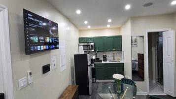 G2 Studio | Living area | 36-inch Smart TV with satellite channels, Netflix, Hulu