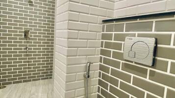 Shower, free toiletries, towels, soap