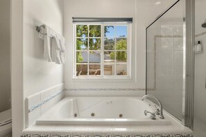 Shower, jetted tub, hair dryer, towels