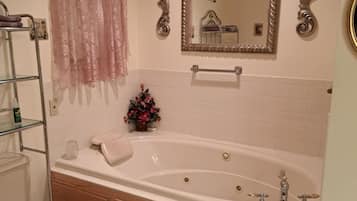 Jetted tub, hair dryer, towels, soap