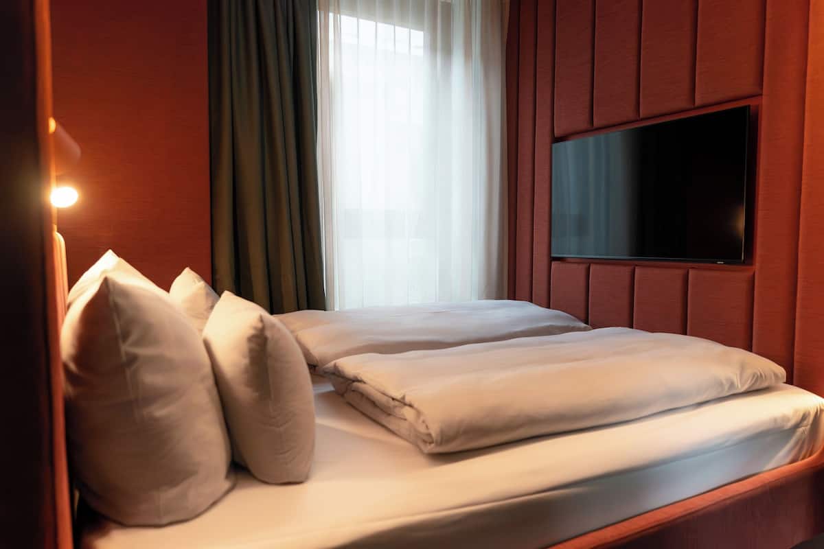 Een kluis op de kamer, gratis wifi, beddengoed