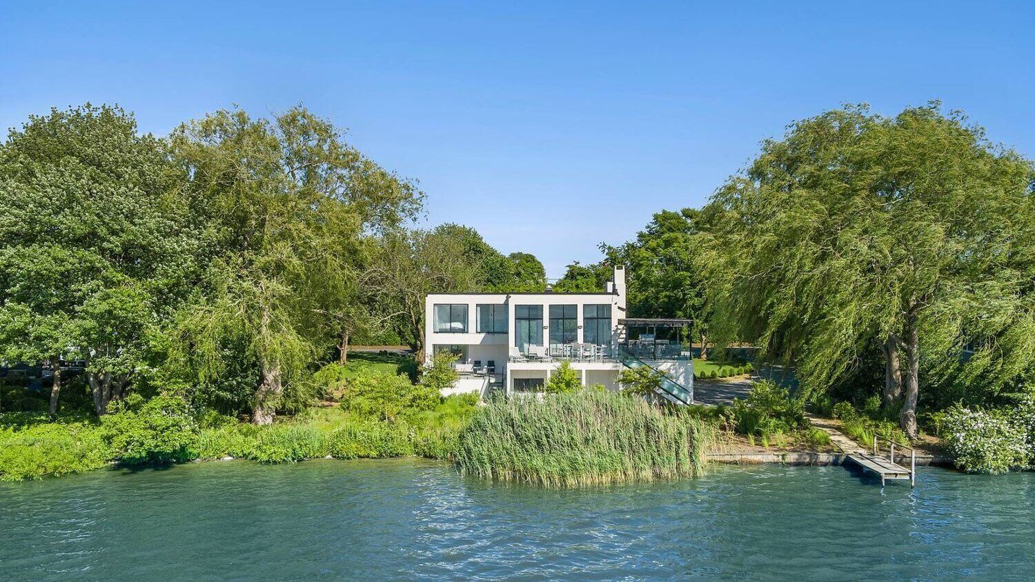 Luxurious and Modern Waterfront Escape on Mill Pond in Water Mill, Perfect...
