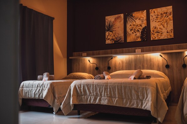 Family Studio Suite, Pool View | In-room safe, blackout curtains, soundproofing, free WiFi - Hotel Boutique Genova (Puerto Iguazú)